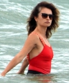 penelope-cruz-seen-wearing-a-red-top-and-black-shorts-while-enjoying-a-day-out-on-the-beach-in-fregene-italy-200721_4.jpg