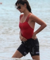 penelope-cruz-seen-wearing-a-red-top-and-black-shorts-while-enjoying-a-day-out-on-the-beach-in-fregene-italy-200721_6.jpg
